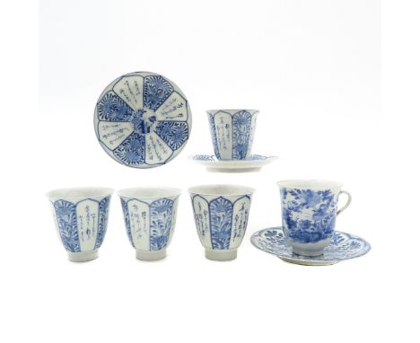 Including 5 cups and 3 saucers, blue and white decor, largest saucer is 15 cm. in diameter, some with chip and hairline.