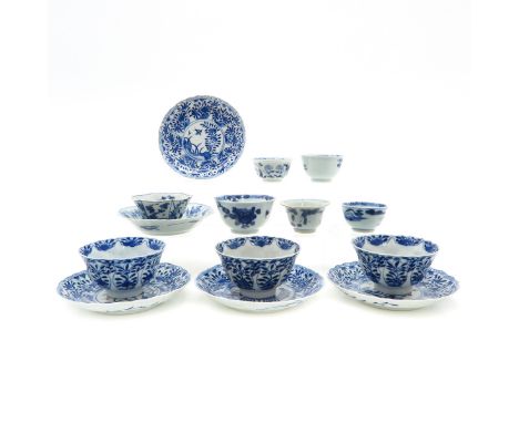 Blue and white decor, 5 saucers and 9 cups, including 18th Century, largest is 13 cm. in diameter, some with chip and hairlin