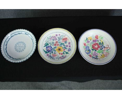 Three Chargers one made by Rye and two by Poole Pottery. The Rye plate with 'Love from the Oliver's' on the base. Dia. 33cm. 