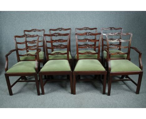 A set of eight Georgian style mahogany ladder back dining chairs, to include two carver armchairs. 