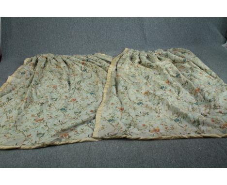 
A matching pair of lined silk mix curtains. Embroidered with pomegranates, figs and flowers. H.220. W. (bottom) 245cm. W.(To
