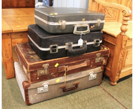 Four vintage suitcases 