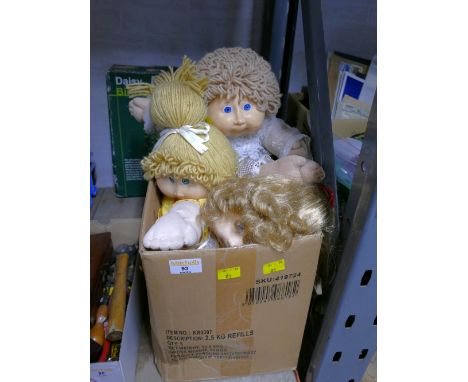 Box of Cabbage Patch dolls 