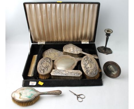 Case containing plated white metal and possibly Chinese silver bamboo and blossom decorated dressing table brush set, some pi