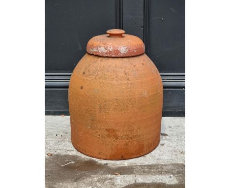 A terracotta rhubarb forcer and cover, 46.5cm high, (chips).&nbsp; 