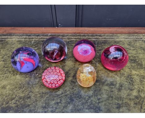 Seven glass paperweights, to include Caithness examples. (7) 