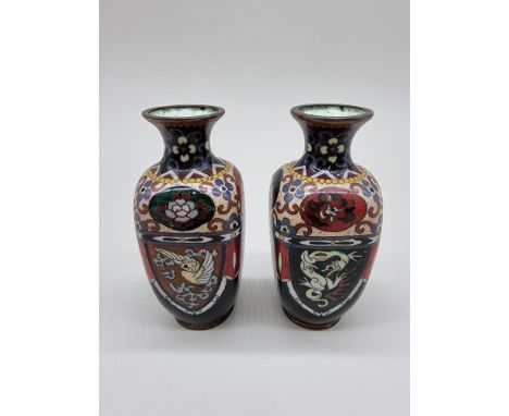 A pair of Japanese cloisonne enamel vases, 12cm high.&nbsp; 