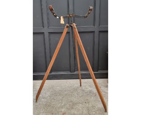 An antique rifle or gun tripod.&nbsp; 