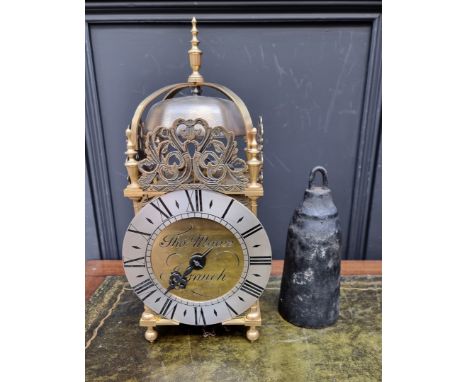 A reproduction brass lantern clock, the 6.5in dial inscribed 'Thos Moore, Ipswich', 36cm high, with weight and pendulum. 