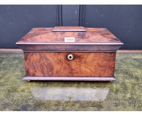 A 19th century mahogany sarcophagus tea caddy, 34cm wide.&nbsp; 