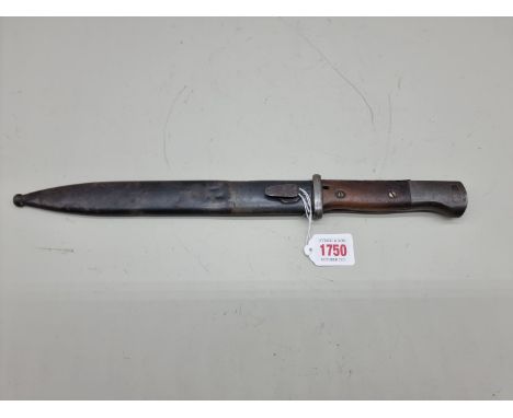 A German World War I M1884/98 Seitengewehr bayonet and scabbard, the blade stamped 'J.A. Henckels&nbsp;Zwillingswerk'. 