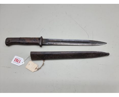 A German World War II K98 bayonet and scabbard,&nbsp;the blade stamped '41 FNJ', the scabbard stamped '44 ASW'. 