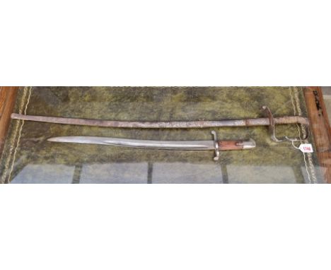 An Austrian sword and scabbard, stamped 'Hoflieferantm Striberny, Wien', with 84cm blade; together with a sword bayonet. (2) 