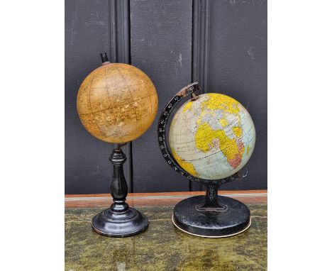 A small antique terrestrial&nbsp;globe,&nbsp;10cm diameter, on ebonized stand; together with another small vintage globe. (2)