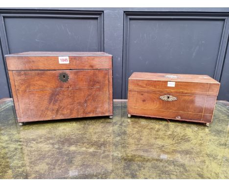 A Victorian walnut and ebony strung work box, 34cm wide; together with a Regency mahogany and line inlaid tea caddy, 29.5cm w