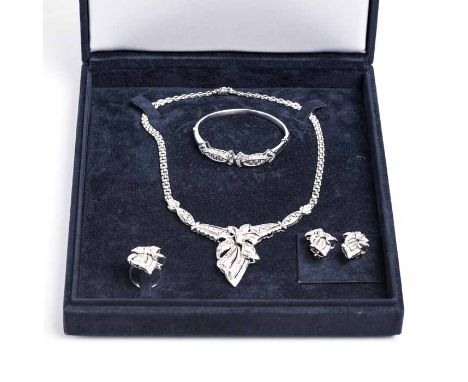 IMPRESSIVE SUITE OF DIAMOND JEWELLERY
comprising of necklace, ring, bangle and earrings, of pierced floral design, set with b