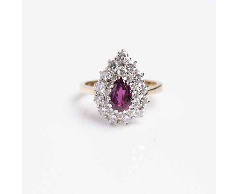 RUBY AND DIAMOND CLUSTER RING
the pear cut ruby approximately 1.26 carats, surrounded by brilliant cut diamonds totalling ver
