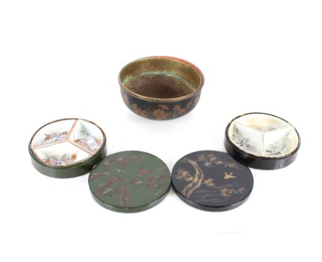 Two Japanese porcelain three section hors d'oeuvres sets, contained in circular lacquered boxes; and a lacquered papier m&aci