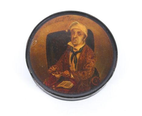 A 19th Century circular papier m&acirc;ch&eacute; snuff box entitled "The Black Draught", 10cm dia.; and a papier m&acirc;ch&