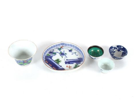 An Oriental leaf shaped dish, decorated buildings and figures, character mark to base, 15cm x 16cm ; a Chinese bowl decorated