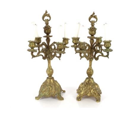A pair of ornate 19th Century brass five light candelabra, 50cm high&nbsp;