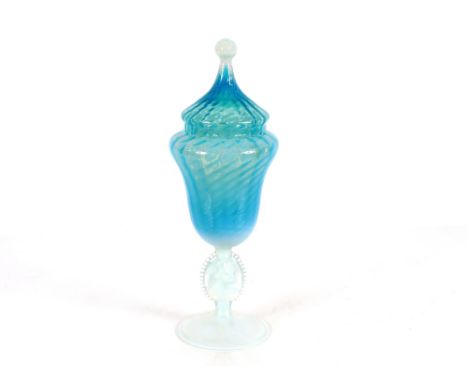 A Murano opalescent glass pedestal lidded goblet, 41cm high; and a matching vase, 33cm high both with intaglio stems on circu