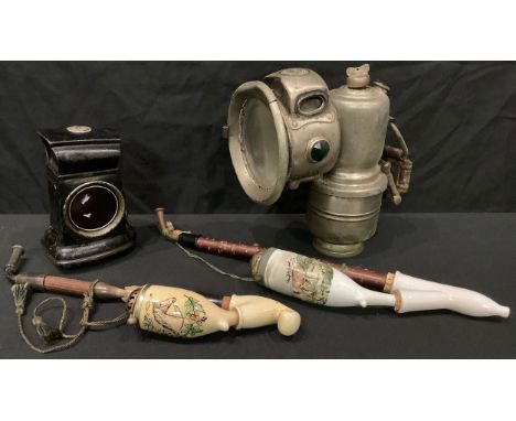 A carbide lamp, The Revenge, Birmingham; another carbide lamp, Lucas; two continental pipes (4) 