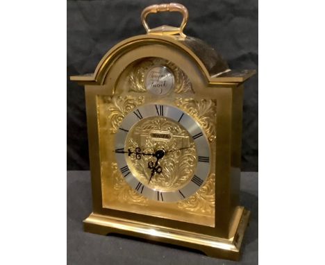 A Swiza brass bracket style alarm mantel clock, arched case, engraved dial with Tempus Fugit cartouche, silvered chapter ring