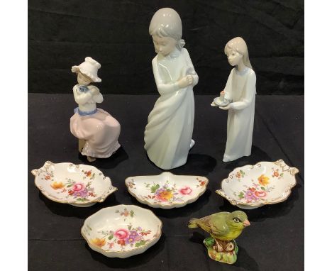 A Lladro figure, Girl with Candle; a Nao by Lladro figure, Girl with Puppy; another; a Royal Doulton Greenfinch; Royal Crown 