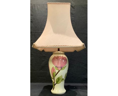 A Moorcroft Magnolia pattern table lamp, 45cm high excluding shade 