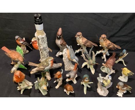 A collection of Goebel bird models including Song Thrush, Chaffinch, Hummingbird, Nightingale, Waxwing, Nuthatch, Kingfisher,