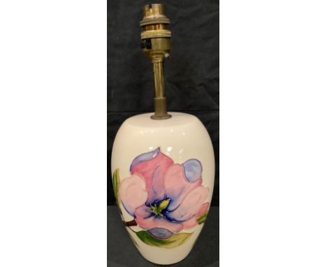 A Moorcroft Magnolia pattern table lamp, 30cm overall 