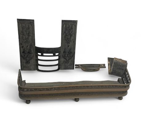Victorian cast iron fire components, to include grate and fender with scrollwork decoration and blackened finish