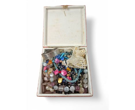 800 Silver bangle and a collection of beaded necklacesCondition Report:Bangle approx 30 grams