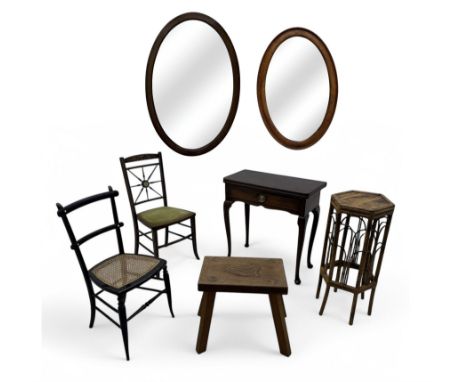 Late 19th century black-painted cane seat chair; early 20th century radial spindle-back chair with green upholstery; early 20