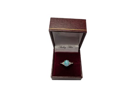 Silver opal and cubic zirconia cluster ring, stamped 925, boxedCondition Report:Size R