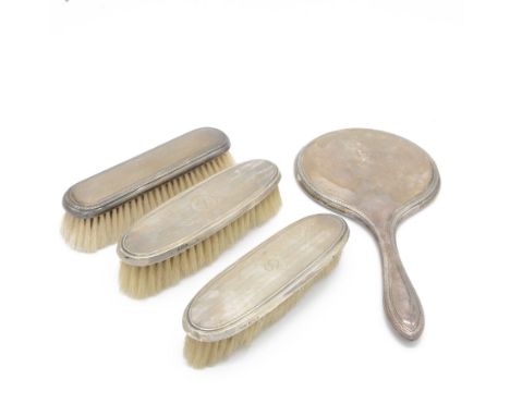 Edwardian silver mounted dressing table items, comprising hand mirror and clothes brush, hallmarked Birmingham 1919 &1920, to