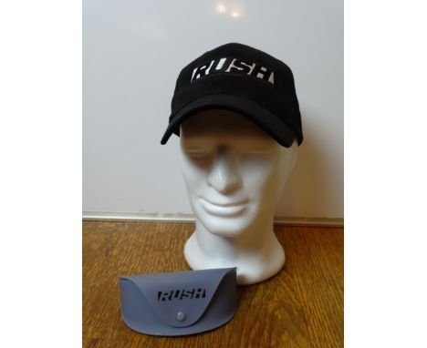 RUSH: - Film / Production Crew Issued Clothing: - A pair of sunglasses which were given as a crew gift and black baseball cap