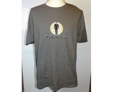 Film / Production Crew Issued Clothing: - A MAN FROM U.N.C.L.E. grey, XL, second unit T-Shirt, a SHERLOCK HOLMES black, XL, s