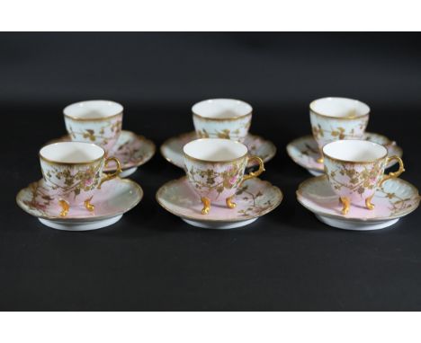 Floral Pink Decorated Cups on Feet with Heavy Gilding - Set of 6 Saucers and 1 Cup (with Old Repair) - Possibly LimogesThis c