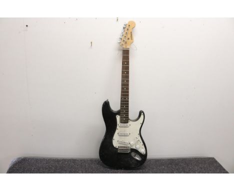 C. Giant Electric Guitar - Black and White Stratocaster StyleThis item is a giant electric guitar fashioned in a black and wh