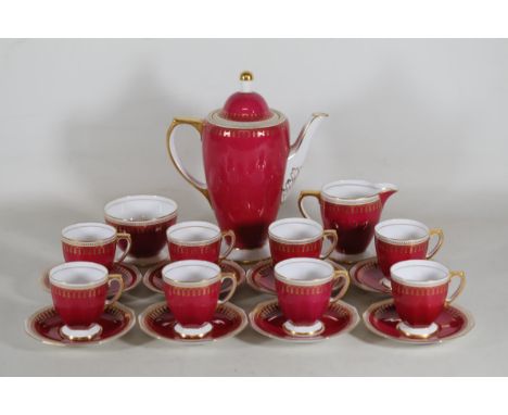 Spode Copeland 'Ryde' Y3132 Coffee Set for 8 in Maroon & GoldThis Spode Copeland 'Ryde' Y3132 coffee set includes 8 cups, sau