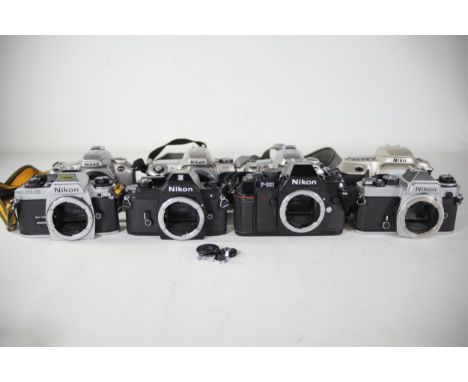 9 various vintage nikon film cameras Some of the shutters work but some do not and some require bits to complete them all bei