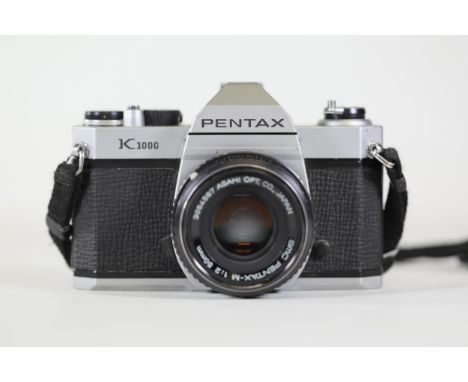 Pentax K1000 35mm Film Camera with SMC Pentax-M 50mm Lens: Shutter sometimes gets stuck due to fabric obstruction but can be 