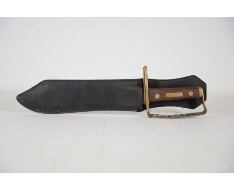 Large Knife with Brass Handle Stamped Taylor L X I Sheffield, 15.5" This item is a large knife with a brass handle, measuring
