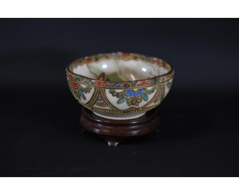 Satsuma Tea Bowl with Gold and Polychrome Enamel Decoration and Mother and Child Scene, Height 2.5", Diameter 5"This Satsuma 