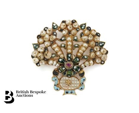 Georgian 18ct yellow gold (tested), enamel and seed pearl brooch. The brooch having a mother of pearl and floral finial set w