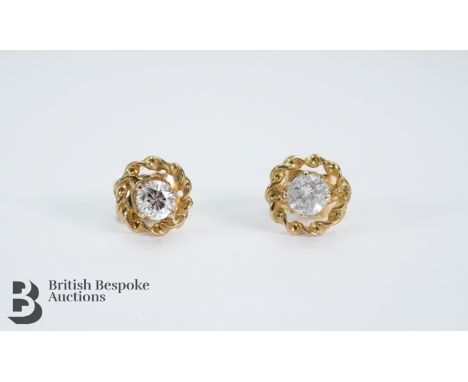 Pair of 14ct diamond stud earrings, boxed. 