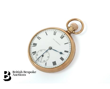 9ct gold open face pocket watch. The pocket watch having a white enamel face with Roman dial and a subsidiary minute dial, Bi