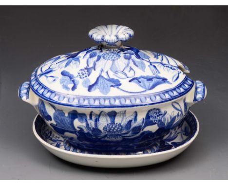 A WEDGWOOD BLUE AND WHITE SMALL TUREEN, COVER AND STAND of oblong form with flower knop finial and printed botanical scene, i